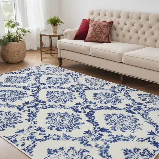 Blue And Ivory Floral Dhurrie Area Rug Photo 1