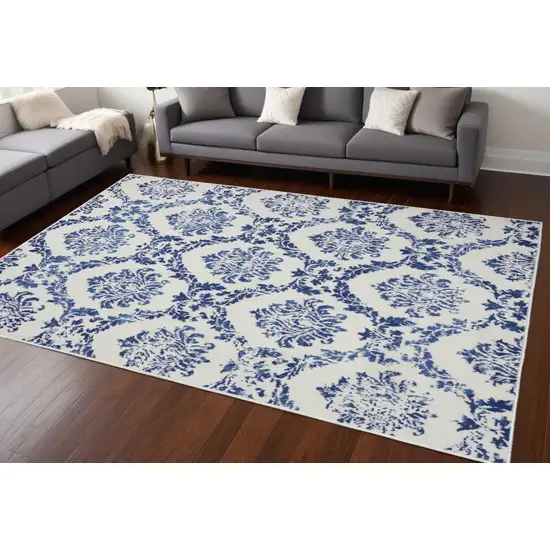 Blue And Ivory Floral Dhurrie Area Rug Photo 1