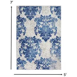 Photo of Ivory and Navy Damask Area Rug