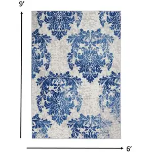 Photo of Ivory and Navy Damask Area Rug