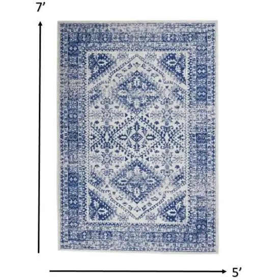 Ivory And Blue Geometric Distressed Area Rug Photo 6