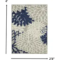 Photo of Ivory and Navy Indoor Outdoor Area Rug