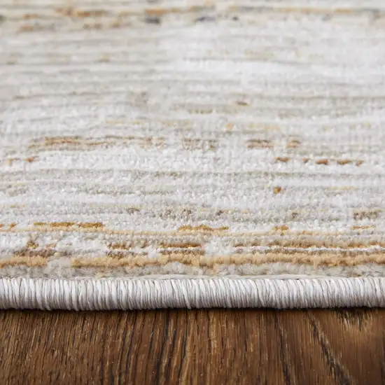 Ivory and Tan Abstract Power Loom Worn Faded Area Rug Photo 8