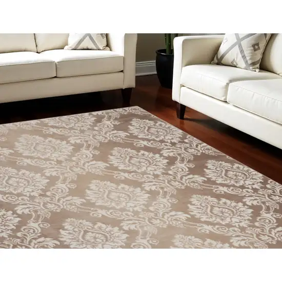 Ivory and Tan Damask Distressed Non Skid Area Rug Photo 1