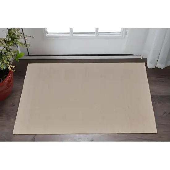 Ivory and Tan Hand Woven Area Rug Photo 1