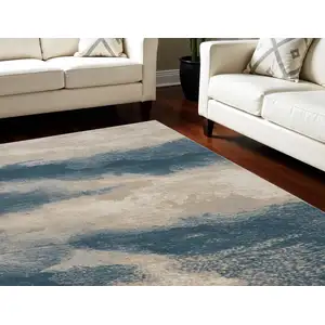 Photo of Ivory and Teal Blue Abstract Non Skid Area Rug