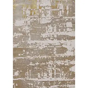 Photo of Ivory or Gold Polypropylene or Polyester Rug