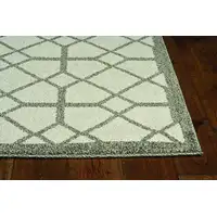 Photo of Ivory or Grey Diamond Pattern Accent Rug