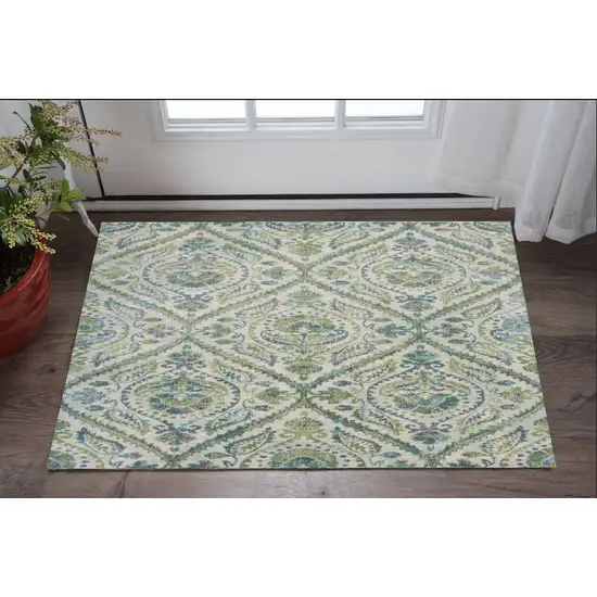 Ivory Or Teal Parisian Polypropylene Area Rug Photo 1