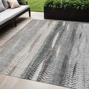 Photo of Khaki Ivory And Gray Botanical Leaves Washable Indoor Outdoor Area Rug