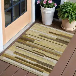 Photo of Khaki Taupe And Gold Striped Washable Indoor Outdoor Area Rug