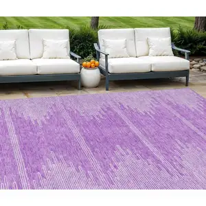 Photo of Lavender And Ivory Abstract Washable Indoor Outdoor Area Rug