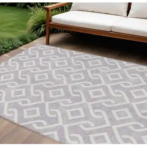 Photo of Lavender And Ivory Geometric Washable Indoor Outdoor Area Rug