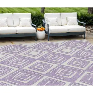 Photo of Lavender And Ivory Geometric Washable Indoor Outdoor Area Rug