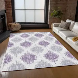 Photo of Lavender Purple And Ivory Ikat Washable Indoor Outdoor Area Rug