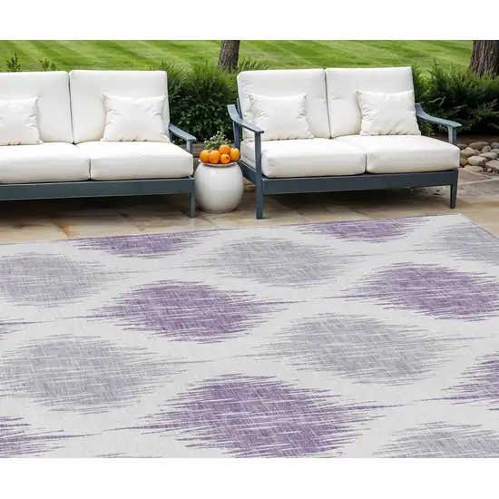 Lavender Purple And Ivory Ikat Washable Indoor Outdoor Area Rug Photo 1