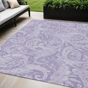 Photo of Lavender Purple And Ivory Paisley Washable Indoor Outdoor Area Rug