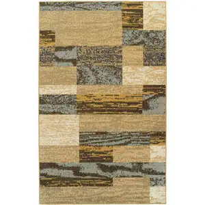 Photo of Light Blue And Beige Patchwork Power Loom Stain Resistant Area Rug