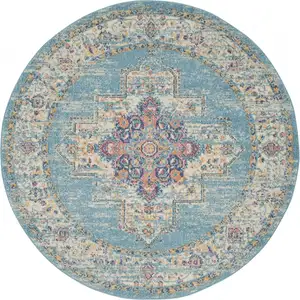 Photo of Light Blue Distressed Medallion Area Rug