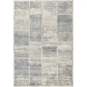 Photo of Light Blue Geometric Power Loom Area Rug With Fringe