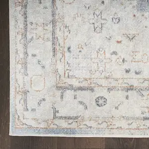 Photo of Light Blue Oriental Power Loom Distressed Washable Area Rug