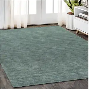 Photo of Light Blue Wool Hand Tufted Area Rug