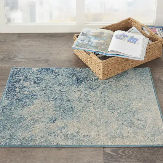 Ivory And Blue Abstract Power Loom Area Rug Photo 9