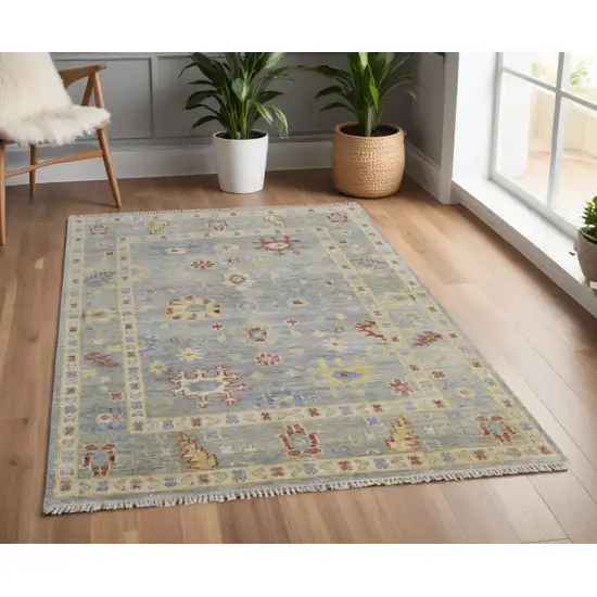 Light Blue and Taupe Wool Floral Hand Knotted Area Rug With Fringe Photo 1