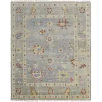 Photo of Light Blue and Taupe Wool Floral Hand Knotted Area Rug With Fringe