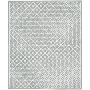 Photo of Light Blue and White Geometric Hand Tufted Area Rug