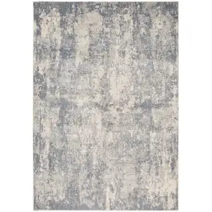 Photo of Light Gray Abstract Power Loom Area Rug