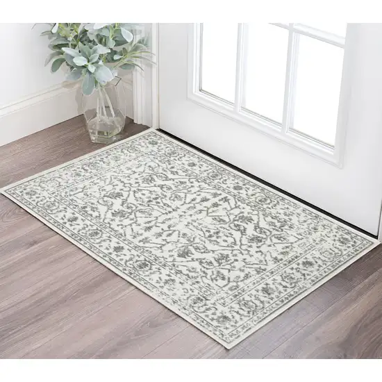 Gray and Light Gray Floral Power Loom Area Rug Photo 1