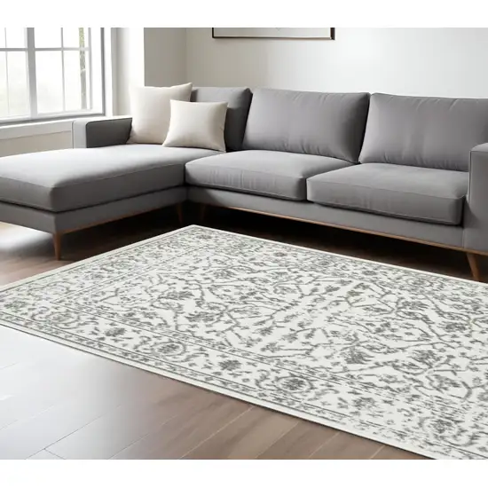 Gray and Light Gray Floral Power Loom Area Rug Photo 1