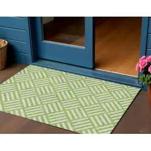 Photo of Lime Green And Ivory Geometric Washable Indoor Outdoor Area Rug