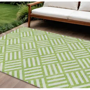 Photo of Lime Green And Ivory Geometric Washable Indoor Outdoor Area Rug