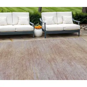 Photo of Merlot And Beige Abstract Washable Indoor Outdoor Area Rug