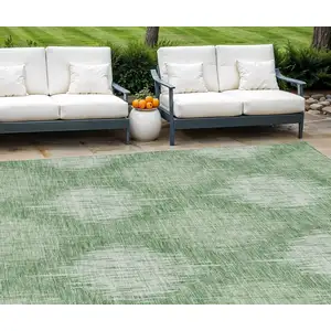 Photo of Mint Green And Fern Green Ikat Washable Indoor Outdoor Area Rug