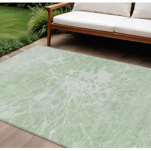 Photo of Mint Green And Ivory Abstract Washable Indoor Outdoor Area Rug