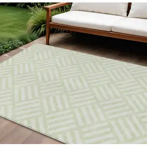 Photo of Mint Green And Ivory Geometric Washable Indoor Outdoor Area Rug