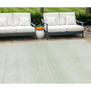 Photo of Mint Green And Ivory Striped Washable Indoor Outdoor Area Rug