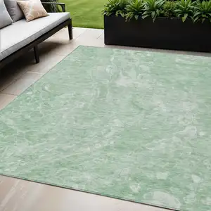 Photo of Mint Green Sage And Ivory Abstract Washable Indoor Outdoor Area Rug