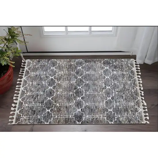 Brown White and Gray Geometric Area Rug With Fringe Photo 1