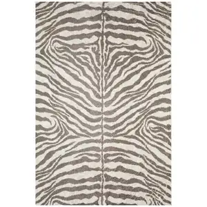 Photo of Mocha and Cream Round Zebra Print Shag Handmade Non Skid Area Rug