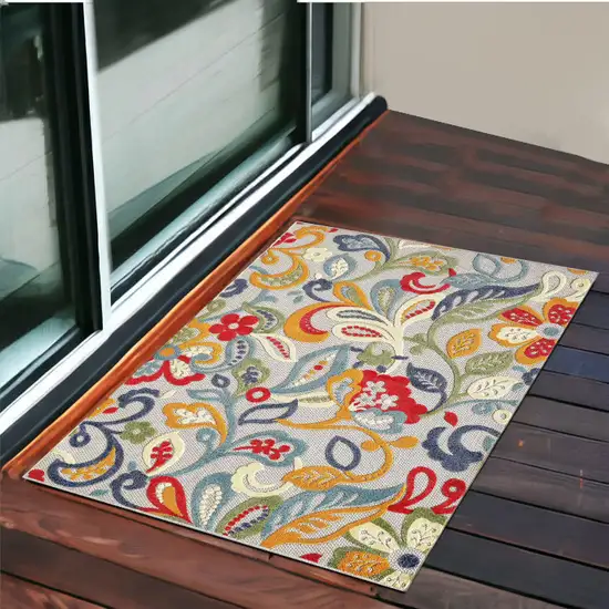 Ivory And Blue Floral Stain Resistant Indoor Outdoor Area Rug Photo 1