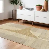 Photo of Natural and Ivory Abstract Hand Woven Area Rug