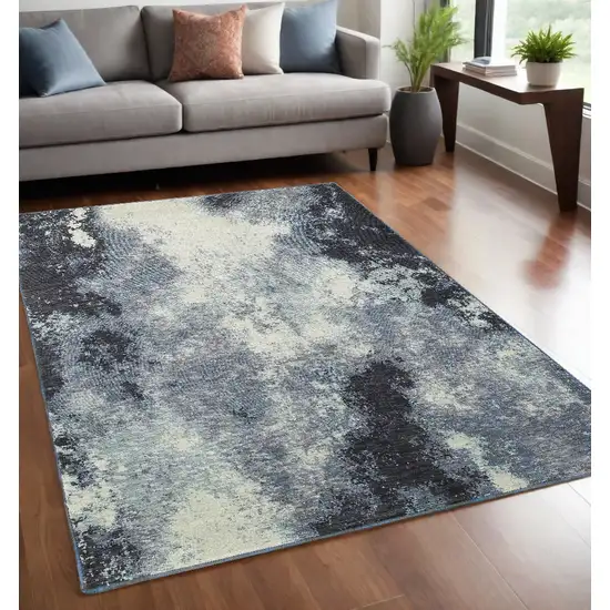 Blue and Ivory Abstract Power Loom Area Rug Photo 1