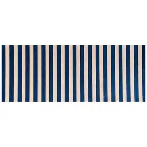 Photo of Navy And Sand Striped Tufted Washable Non Skid Area Rug