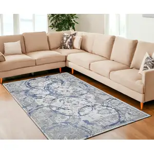 Photo of Navy Blue Abstract Area Rug With Fringe