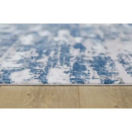 10' Blue and Off White Abstract Washable Non Skid Runner Area Rug Photo 9