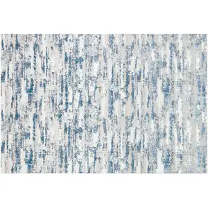 Photo of Navy Blue Abstract Washable Non Skid Area Rug With Fringe